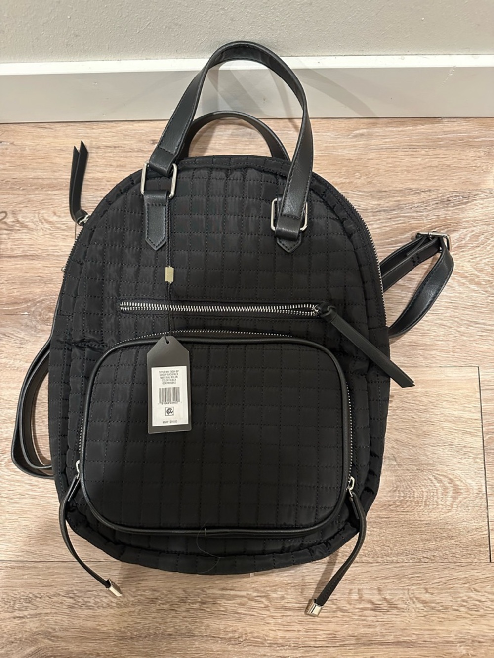 Brand new Max Studio Black Backpack Bag- has lots of pockets - wallet area
